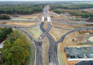 aerial photo of highway with diverging diamond interchange under construction